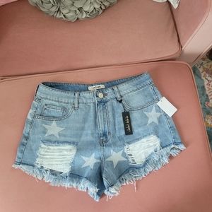 Distrested Jean shorts with start print